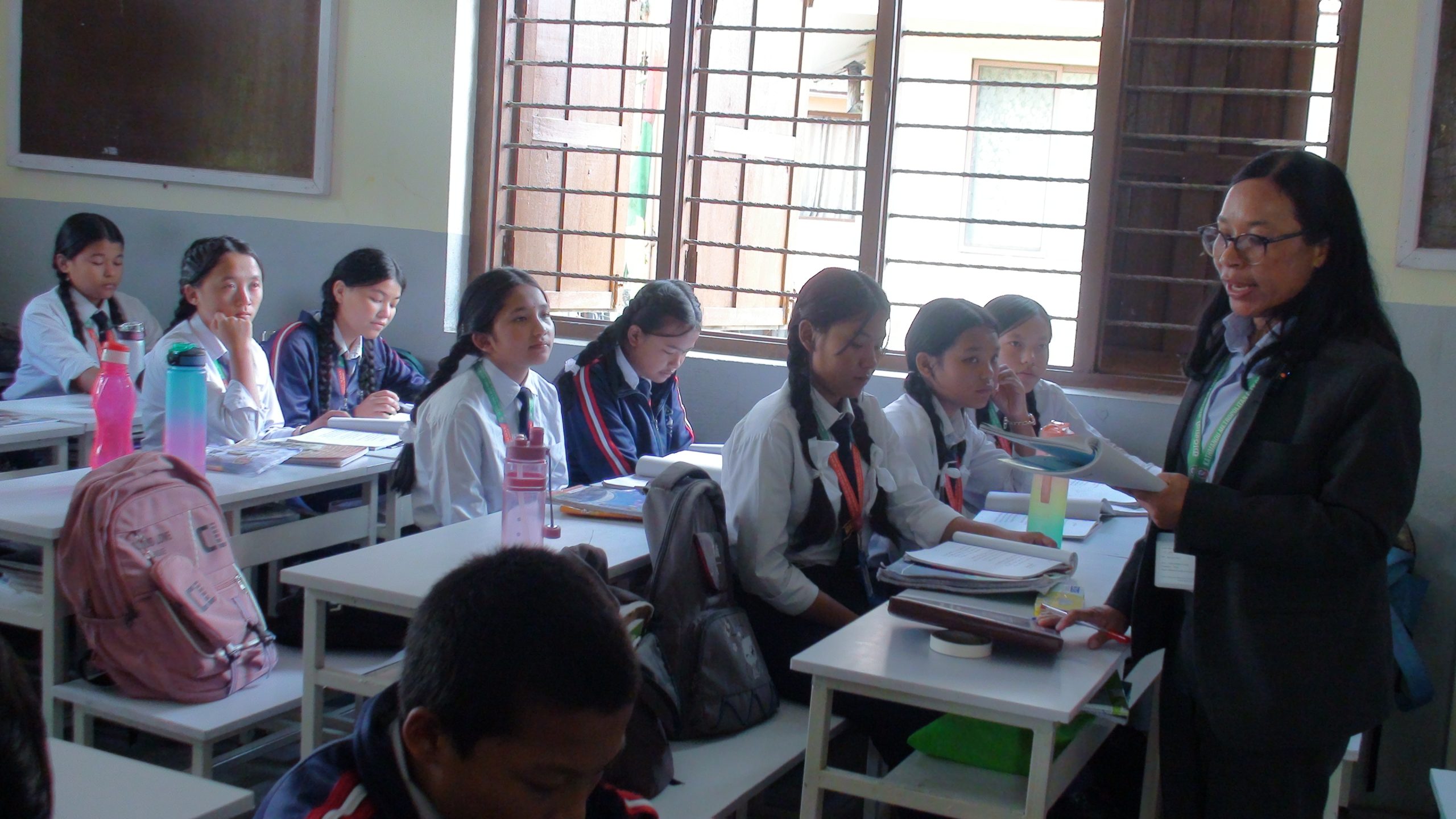 Pictures taken by us when we arrived at Sri Mahendra Boudha Secondary School located in Kathmandu Metropolitan City Ward No.6, Boudha, where Tamang mother tongue is being taught in Sambhota script.